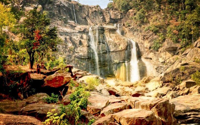 Scenic Netarhat waterfalls near Ranchi, Jharkhand, surrounded by lush green forests and beautiful natural landscapes
